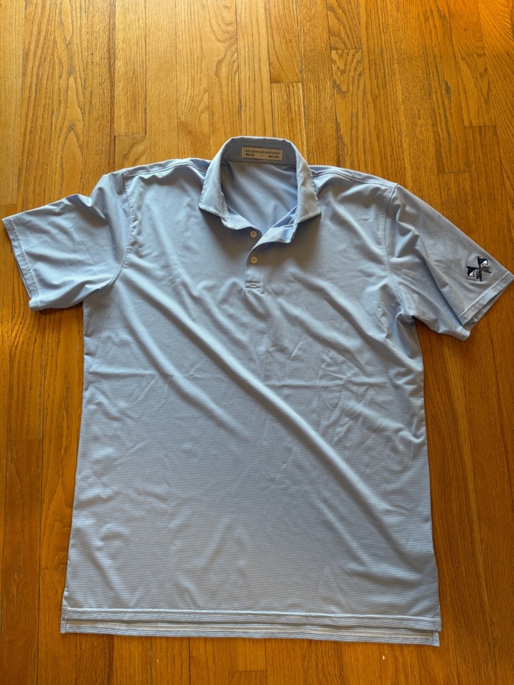 Men's Light Blue Performance Polo with Subtle Sleeve Logo